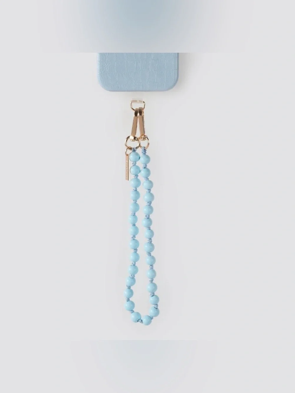 NIB Beaded Phone Wrist Strap in Light Blue with Gold Hardware